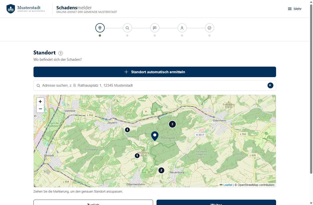 Erster Schritt des Schadensmelders: Karte mit Standortnadel und Adresssuche