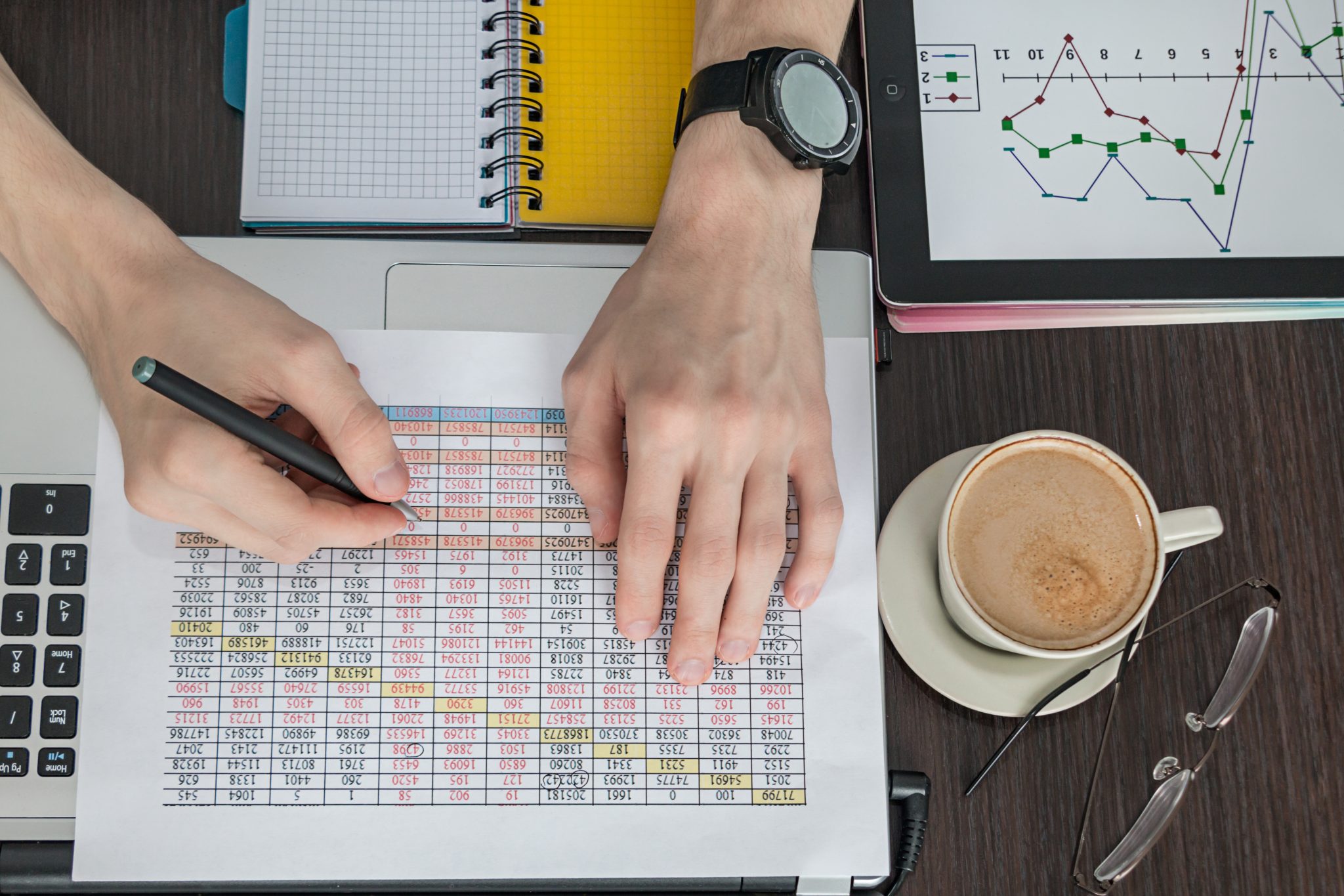 closeup-male-hands-doing-financial-calculation-2025-03-10-07-42-21-utc